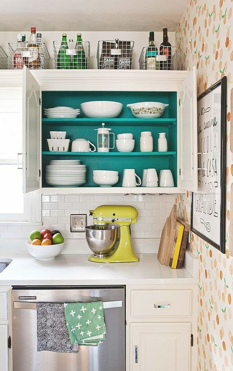 FROM POP SUGAR - ADD A POP OF COLOR INSIDE A CABINET! 