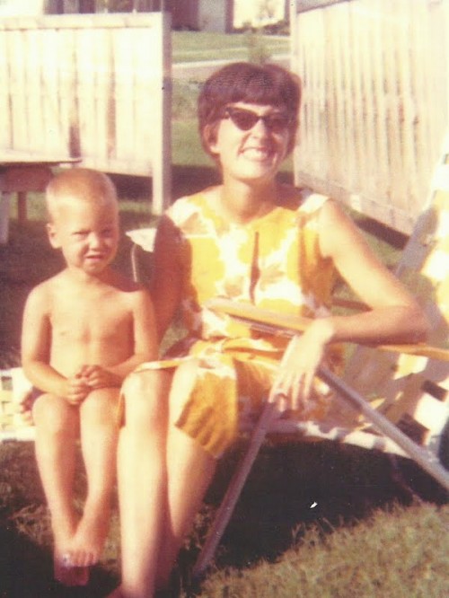My Mom and my brother Ford...notice the Ciggy in my Mom's hand and the bandaid on Ford's toe.