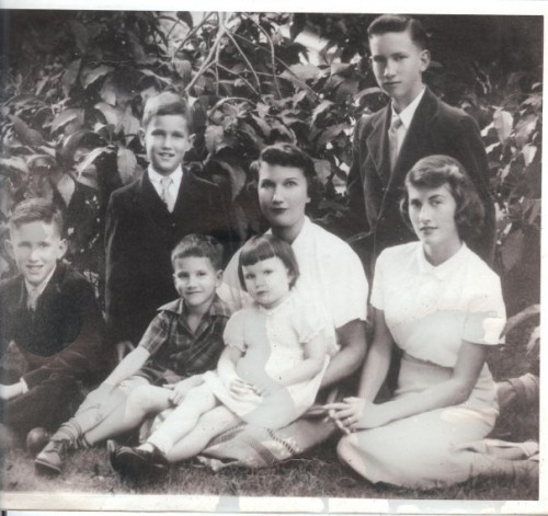 MY MOMS FAMILY...my mom is on the bottom far right...her Mother center holding her baby sister, Susie. and her brother Dick is right behind her. brother Dick