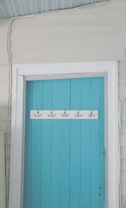 THIS DOOR GOES TO A SMALL ROOM WHICH I NOW USE TO HOUSE ALL OF MY ART SUPPLIES…SUPER HANDY!!! I LOVE THE SLANTED LINES…