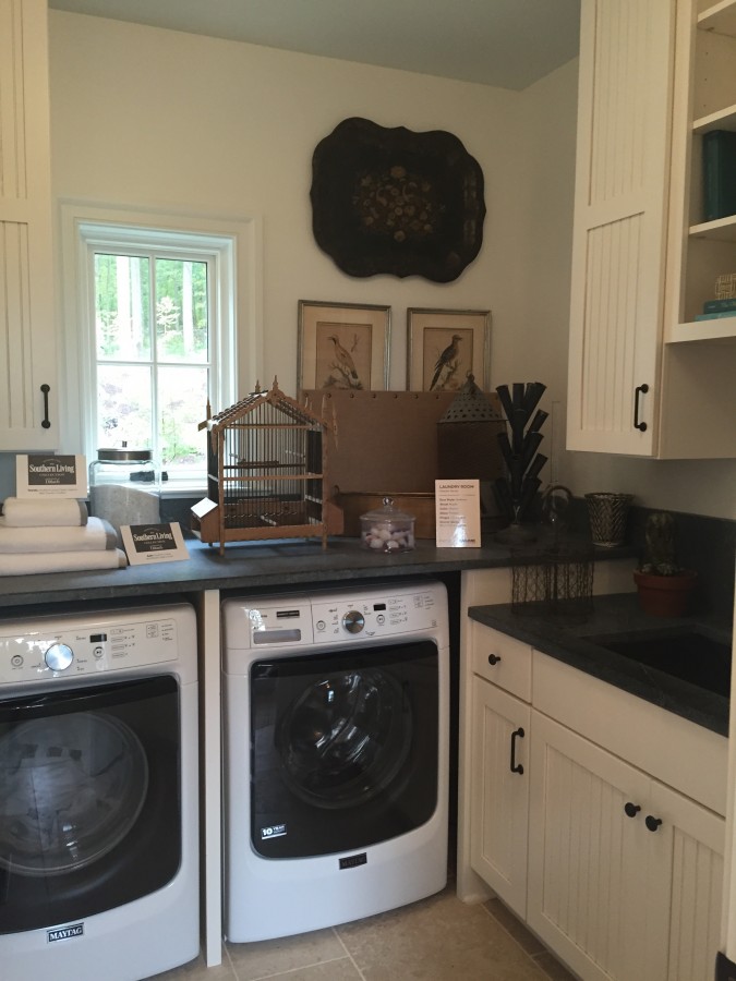 THE LAUNDRY ROOM IS OFF THE MUDROOM